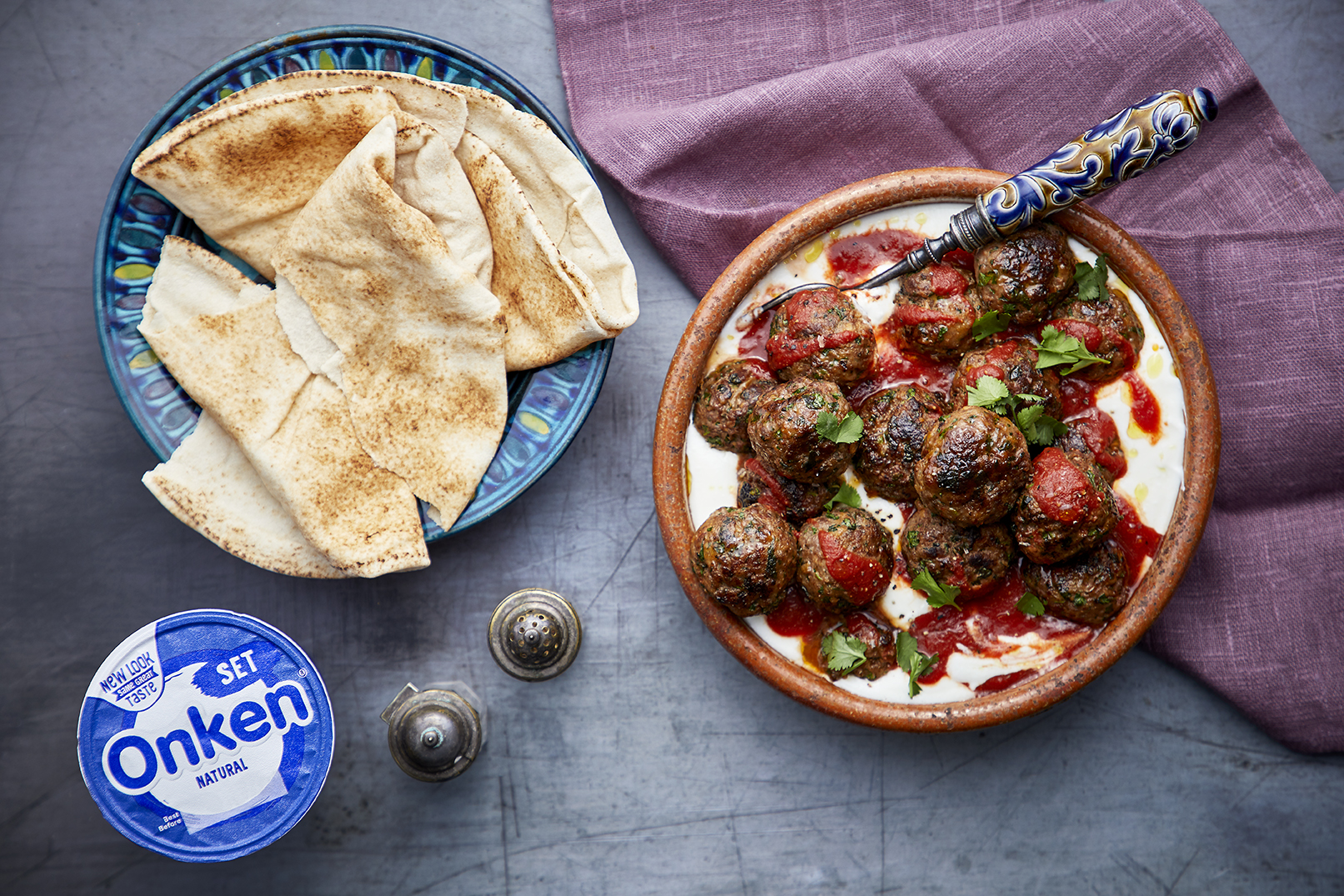 Meatball and Tomato Tagine Served With Yogurt